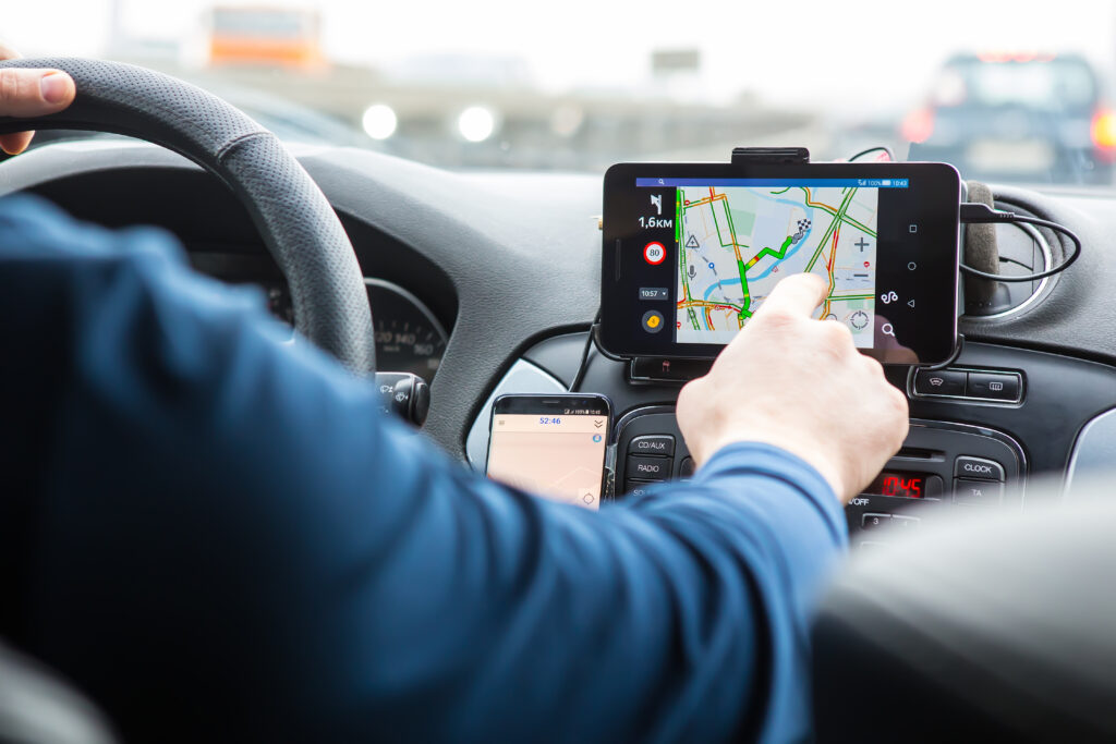 A driver navigating via GPS