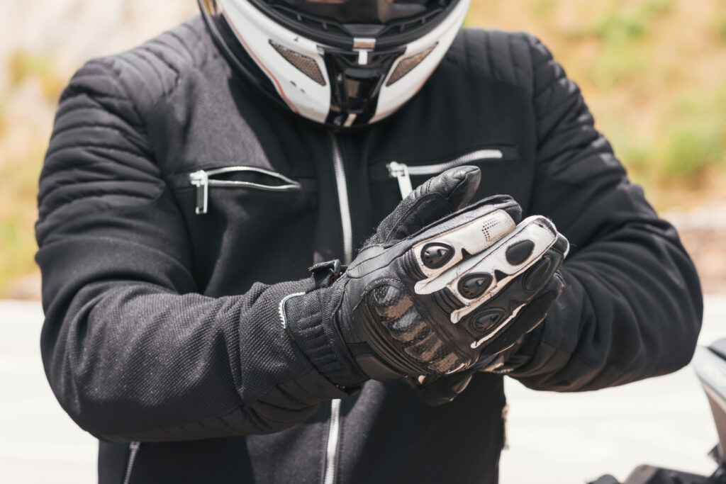 A rider in proper motorcycle gear.