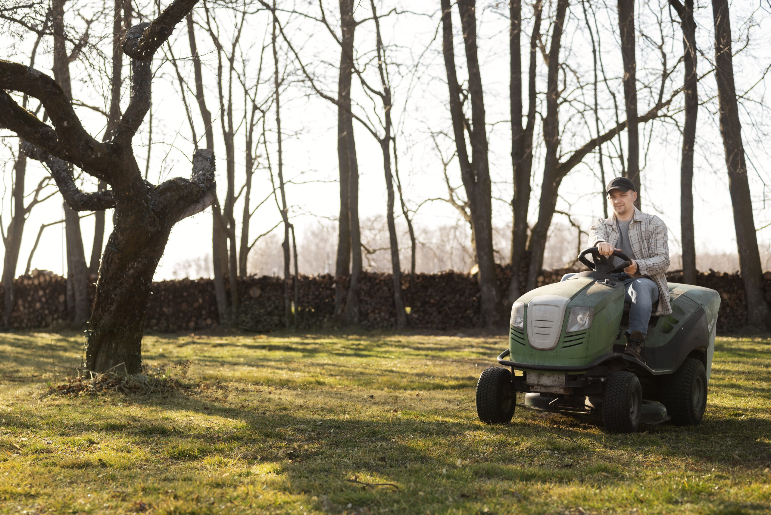 man on riding mower